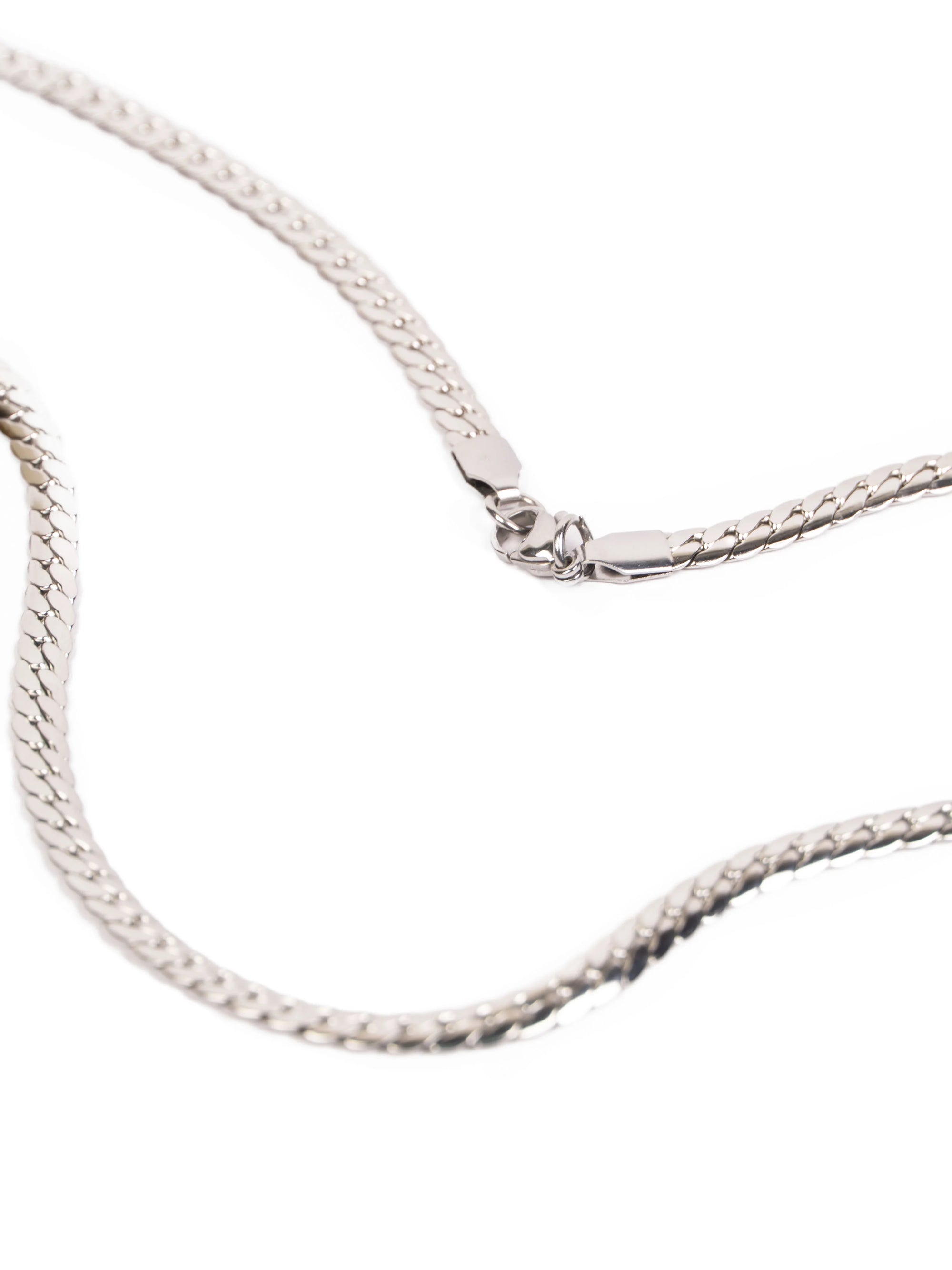Silver chain necklace on a white background