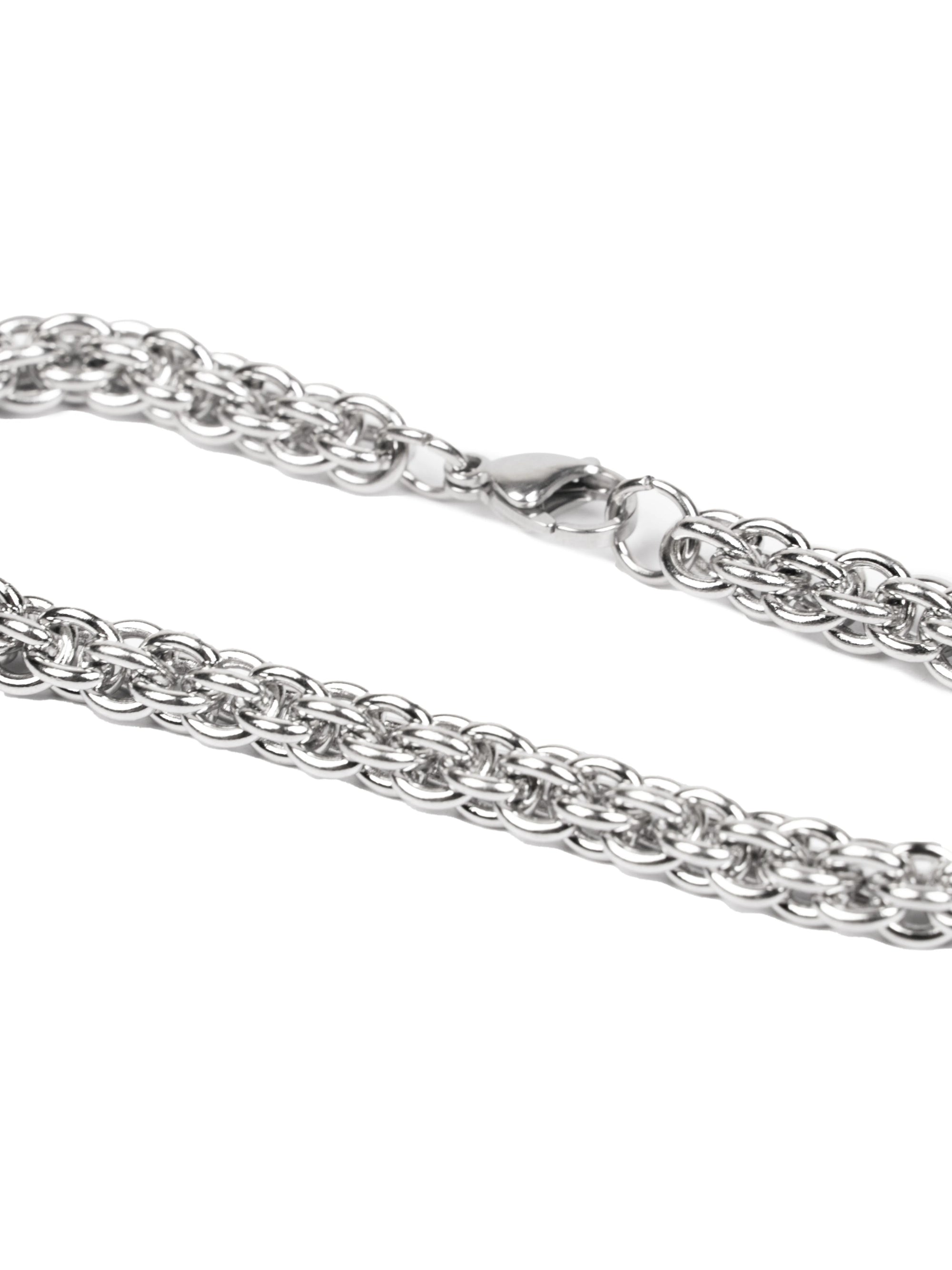 Silver chain bracelet on a white background