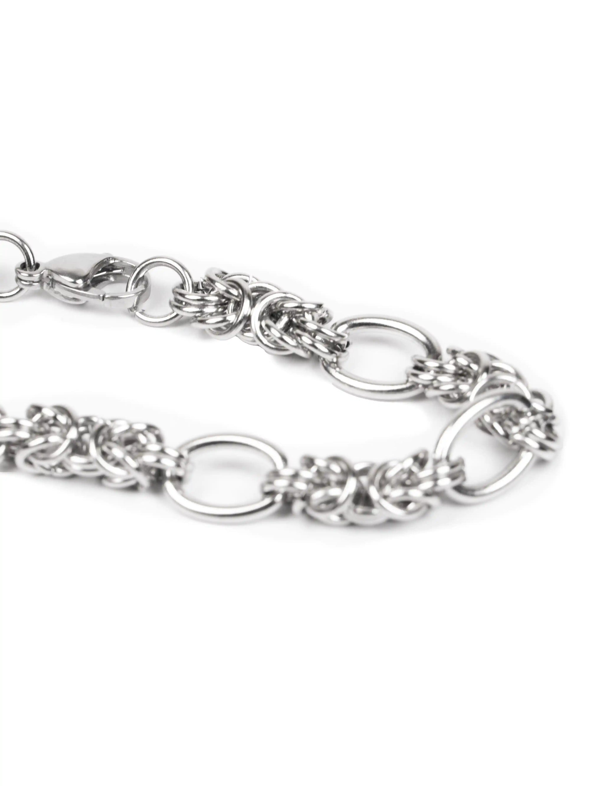 Silver chain bracelet on a white background stawp