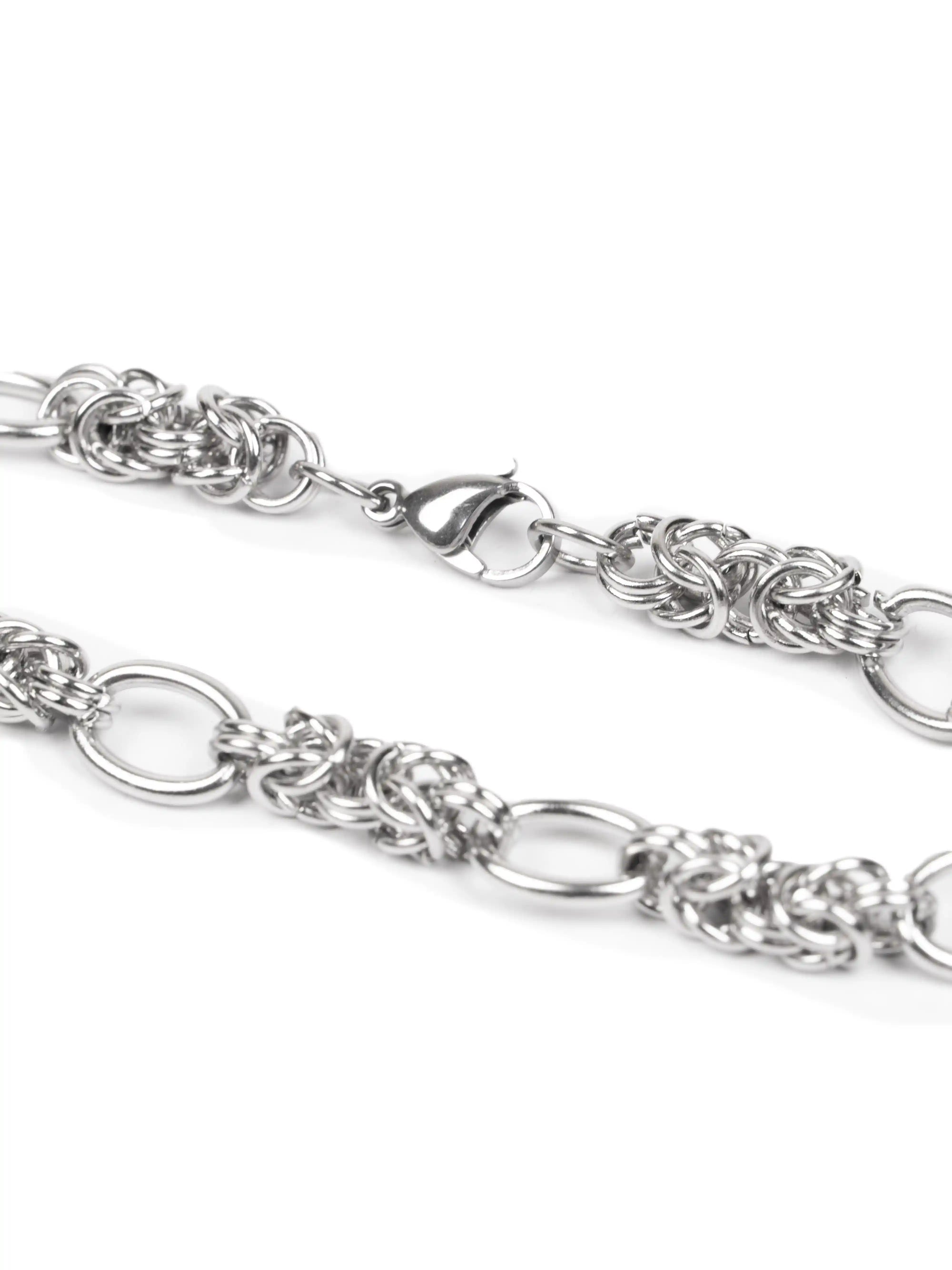 Silver chain bracelet on a white background stawp
