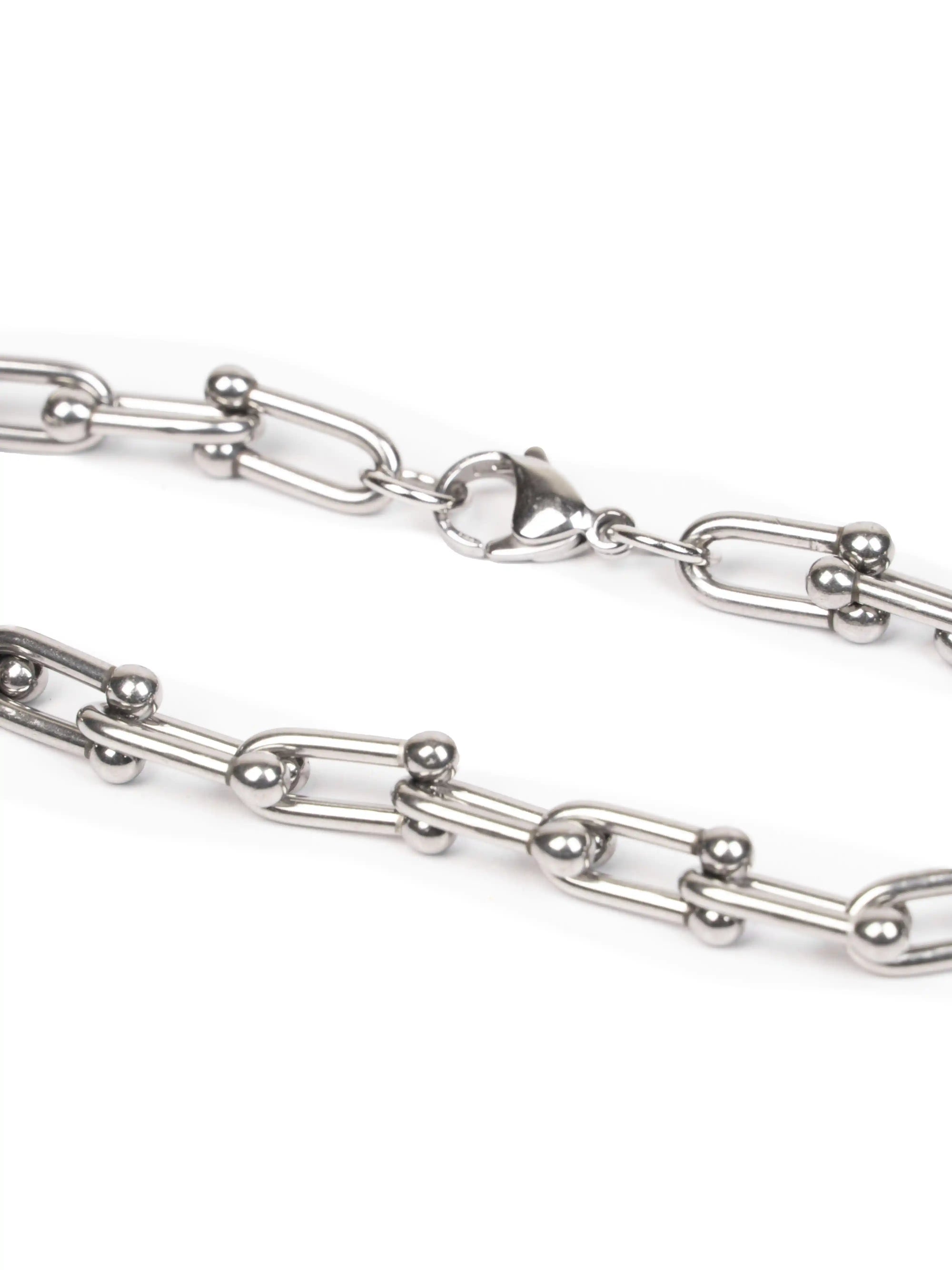 link bracelet Silver chain with a clasp on a white background stawp