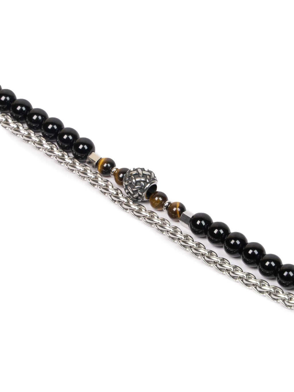 Necklace with black beads and a silver chain on a white background
