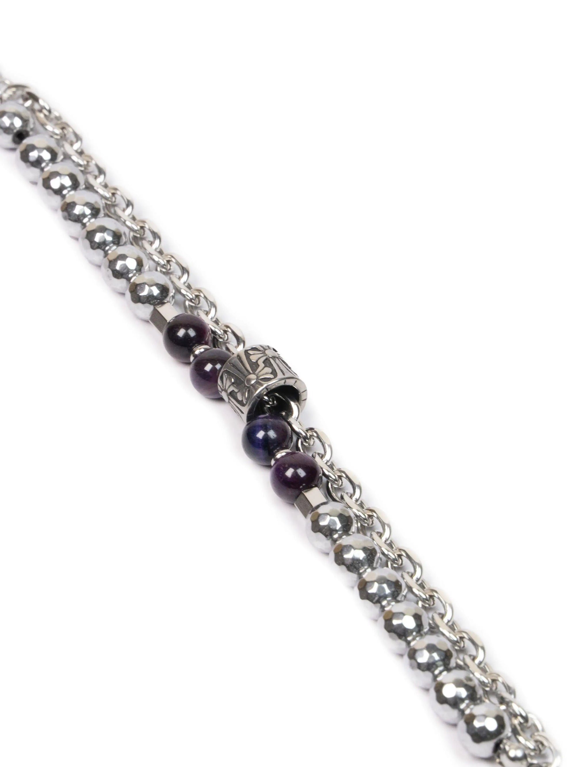 lunar bracelet
Silver bracelet with purple beads on a white background