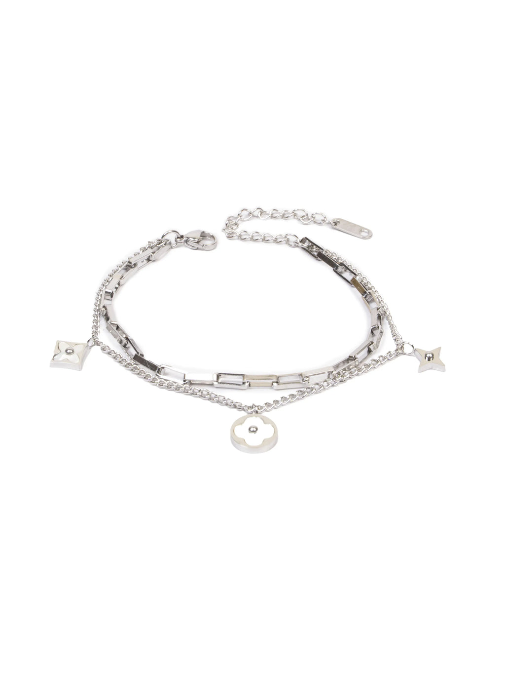 Stack of silver bracelets with various charms on a white background