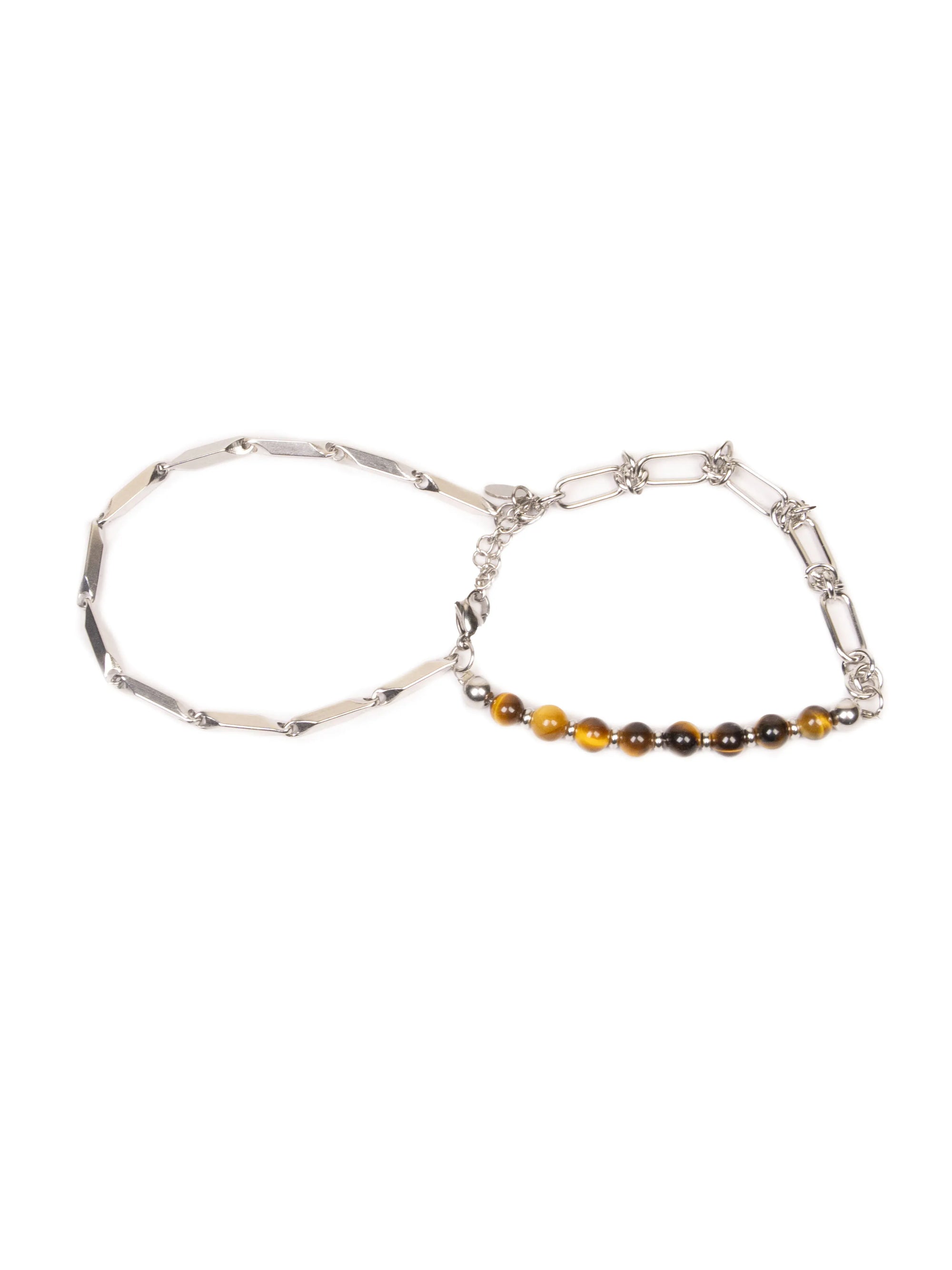Silver bracelet with black and yellow beads on a white background
