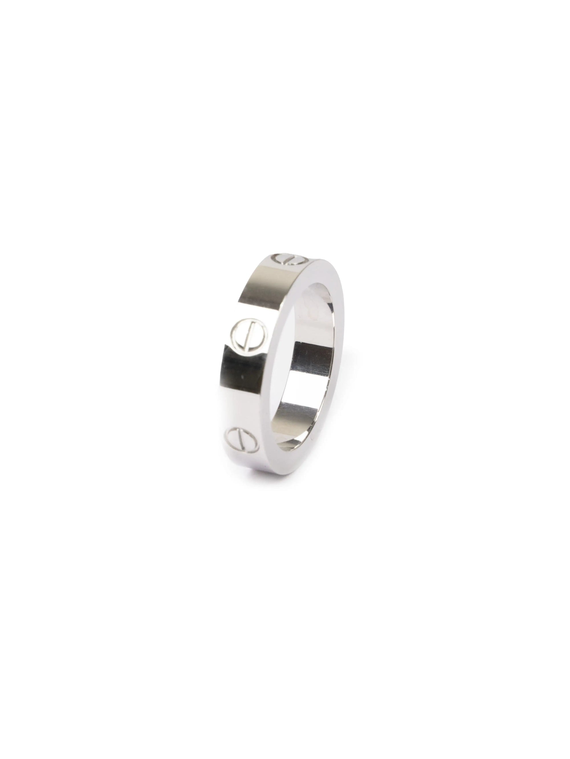 cupid ring 
Silver ring with engraved design on a white background